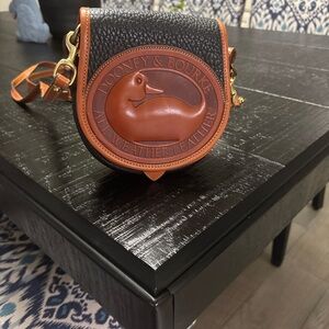 Dooney & Bourke Black and Brown All-Weather Leather Crossbody Saddle Bag